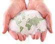 Sand with map of the world in the hands Sand with map of the world in the hands