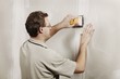 Man Using A Sander