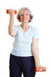 Seniorin beim Kraftsport Seniorin beim Kraftsport