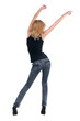 Young woman dancing. Rear view. Young woman dancing. Rear view.