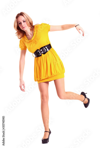 Photo: woman in yellow woman in yellow