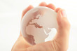 hand holding globe to protect the fragile environment hand holding globe to protect the fragile environment