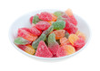 sugar coated gumdrops in a bowl isolated sugar coated gumdrops in a bowl isolated