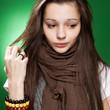 portrait of a young girl over green