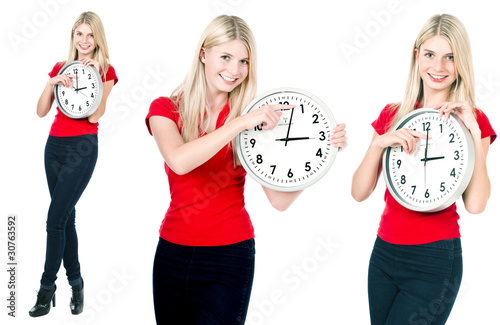 Photo: Blonde beautiful girl with the clock Blonde beautiful girl with the clock