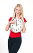 Blonde beautiful girl with the clock