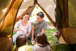 Happy family camping in the park