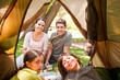 Happy family camping in the park