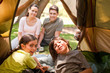 Happy family camping in the park