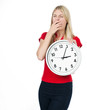tired young woman with the clock