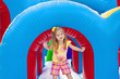 Child playing on Inflatable Playground Child playing on Inflatable Playground
