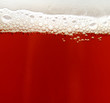 close-up of red beer glass (background)