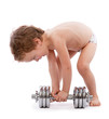 Little boy trying to lift heavy dumbbell Little boy trying to lift heavy dumbbell