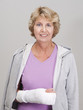 Elderly woman with arm in cast