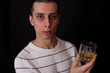 portrait of man with glass of whisky portrait of man with glass of whisky