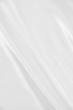 Smooth elegant white silk as wedding background Smooth elegant white silk as wedding background