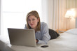 Woman working in hotel room