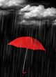 red umbrella in heave rain