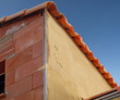 Crépissage d'un mur en briques Crépissage d'un mur en briques