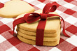 Heart shaped cookies with red ribbon