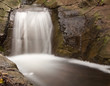 Small waterfall landscape with long exposure high in river