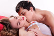 Foto: Couple making love in bed Couple making love in bed