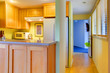 Kitchen and hallway with open door