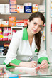 Pharmacy chemist woman in drugstore Pharmacy chemist woman in drugstore