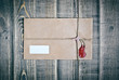 Vintage postal envelope on wooden table