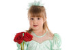 The little girl with a bouquet of roses