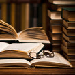 opened book, lying on the bookshelf