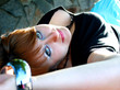 The red-haired girl with the big green eyes is lying