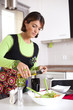 Woman preparing food at the kitchen