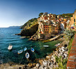 Cinque Terre, Italy - Riomaggiore colorful fishermen village. Cinque Terre, Italy - Riomaggiore colorful fishermen village.
