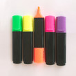 Five black color markers on gray background
