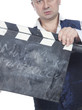 Man with clapperboard Man with clapperboard