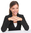 Businesswoman sitting at table smiling Businesswoman sitting at table smiling