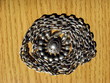 silver chain and medallion