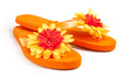 orange flip-flops with flowers