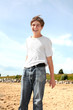teenager stand on the beach teenager stand on the beach