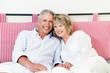 Happy mature couple at home
