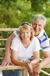 Mature couple smiling and embracing Mature couple smiling and embracing