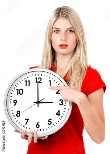 Photo: Young businesswoman with a clock Young businesswoman with a clock