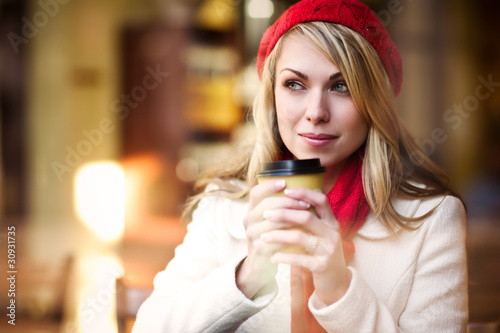 Photo: Woman drinking coffee Woman drinking coffee