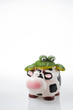 A frog over a cow A frog over a cow