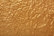 Foto: Crumpled gold paper Crumpled gold paper