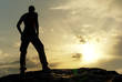 Silhouette of man in mountain.