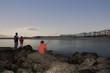 Father with two suns fishing on Paradise beach of Langebaan, South Africa
