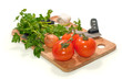 fresh tomatoes, onion, garlic and parsley isolated on white