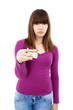 Teenager holding packet of cigarettes